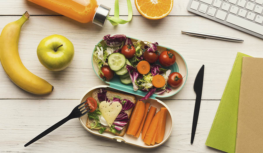 a lunch box with vegetables and fruits

For Office Lunch